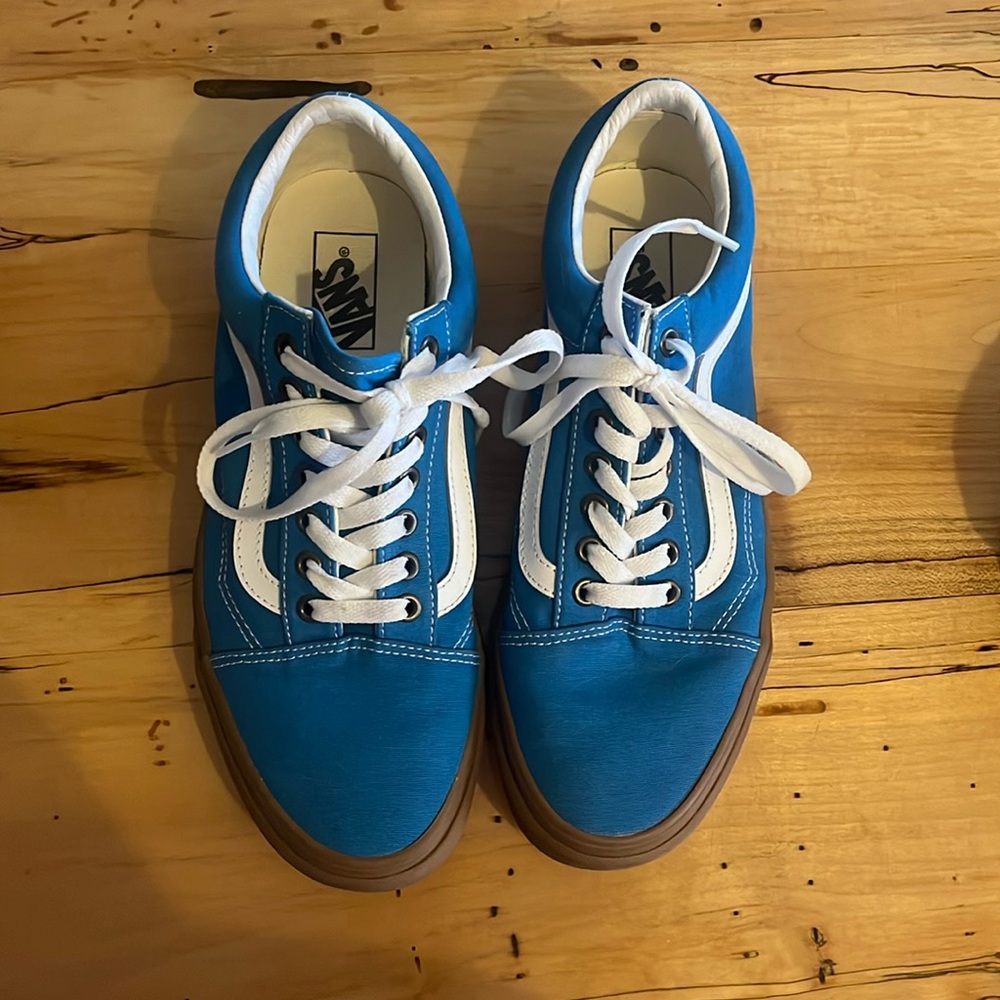 Blue Vans. Mens 8.5 Womans 10. Like new condition, only worn once maybe twice.